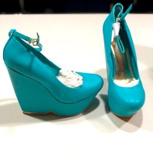 Brand new turquoise wedge heels